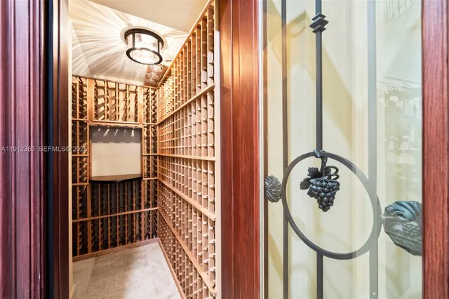 a view of a staircase with wooden floor and mirror