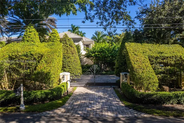 an aerial view of a house with a garden