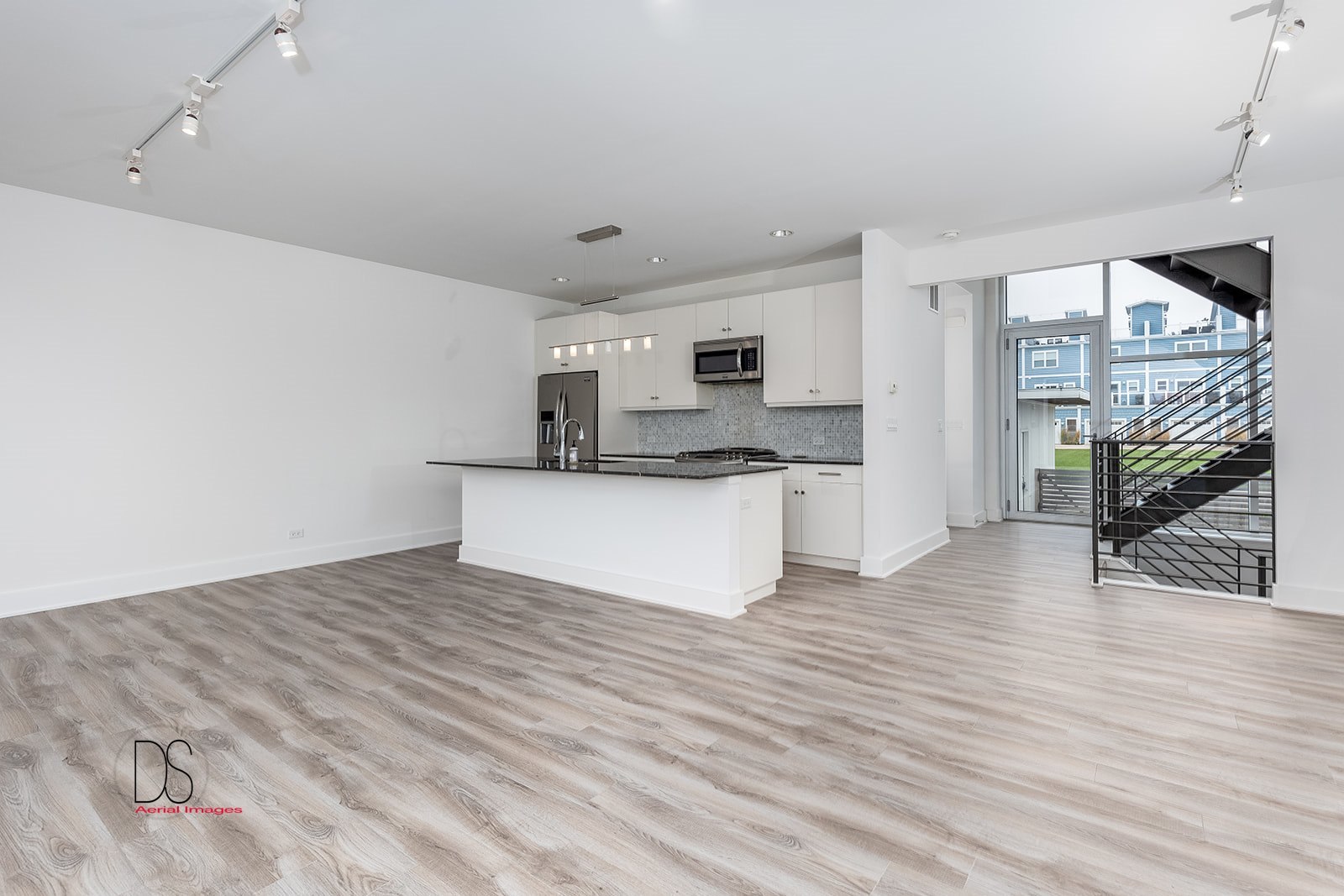 45 Windward Way Ottawa, IL 61350 - Photo 15 of 29 a view of a kitchen with a sink and a refrigerator