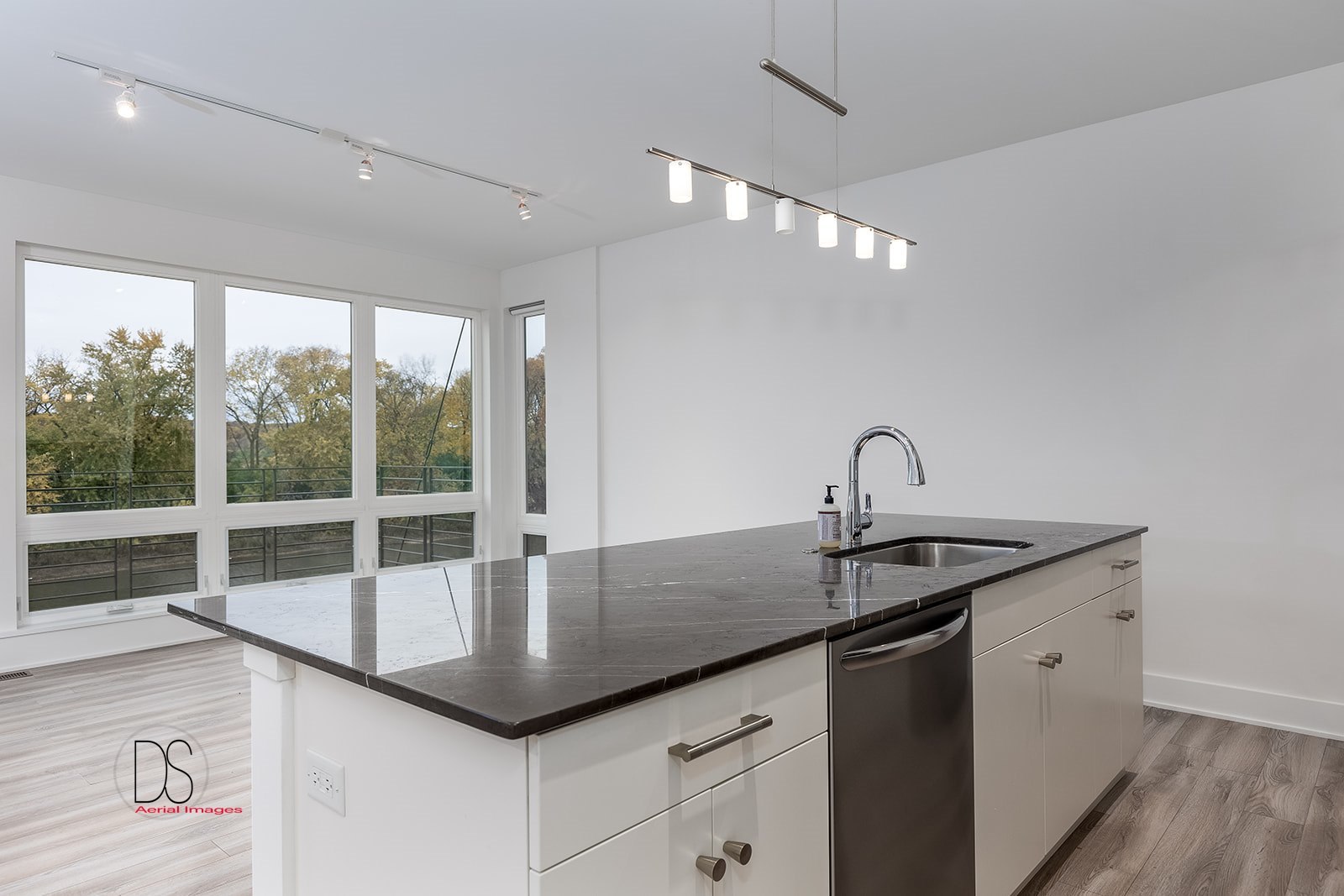 45 Windward Way Ottawa, IL 61350 - Photo 18 of 29 a kitchen with granite countertop a sink and white cabinets