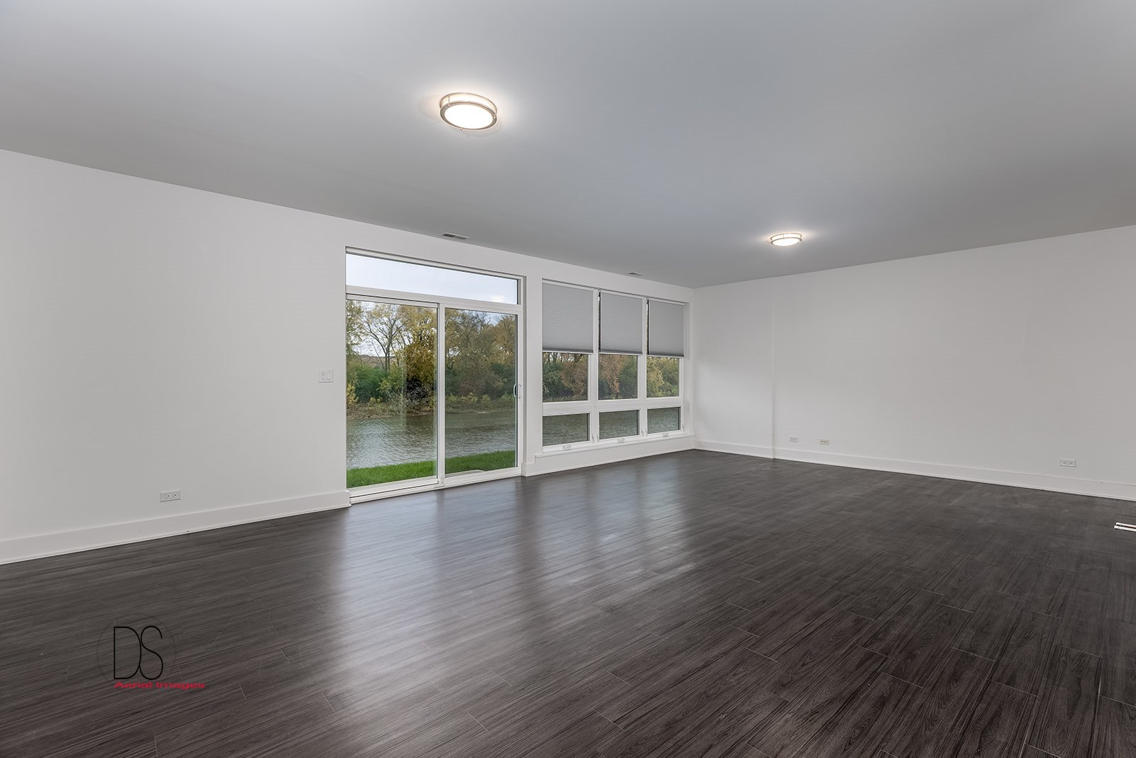 45 Windward Way Ottawa, IL 61350 - Photo 28 of 29 a view of an empty room with wooden floor and a window