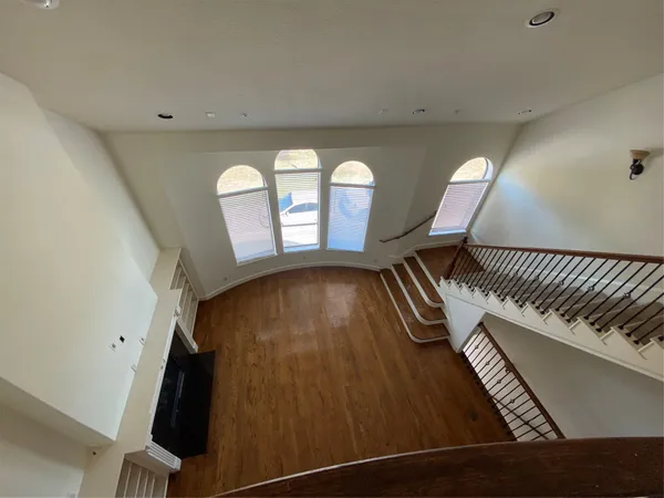 a view of an entryway with wooden floor