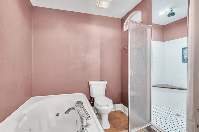 a bathroom with a sink and toilet