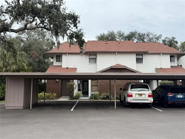 a car parked in front of a house