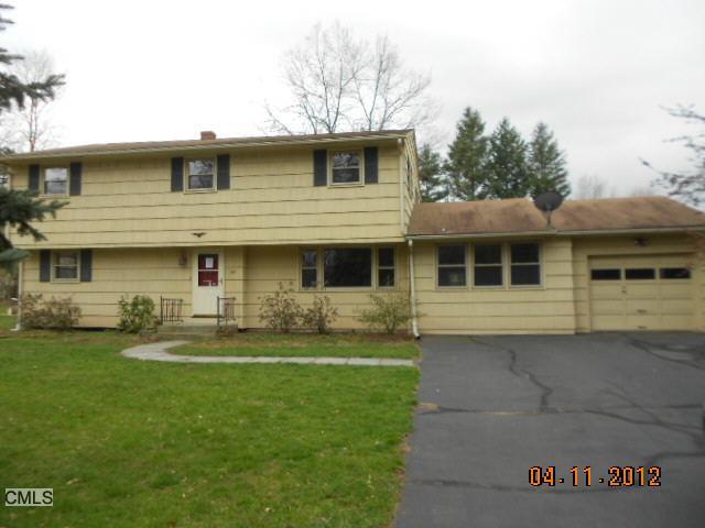 115 Country Club Road Cheshire, CT 06410 - Photo 1 of 1 a front view of a house with a garden