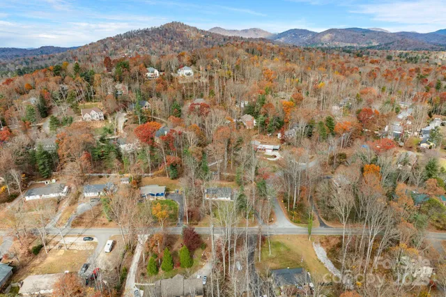 a view of backyard with green space
