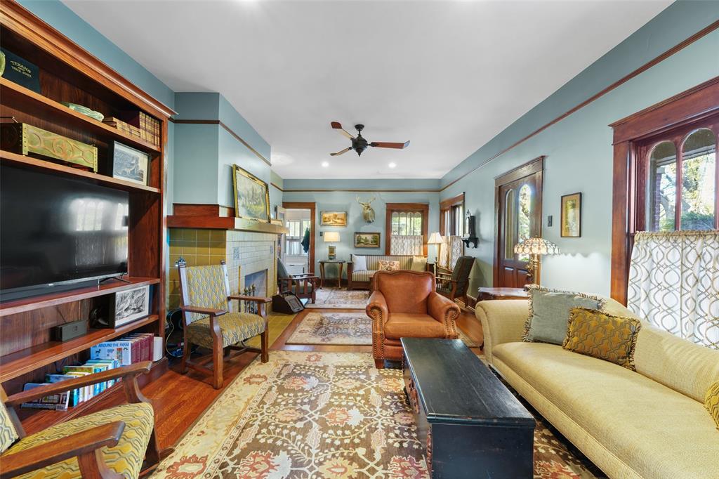 406 Griffith Avenue Terrell, TX 75160 - Photo 11 of 40 a living room with furniture and a flat screen tv