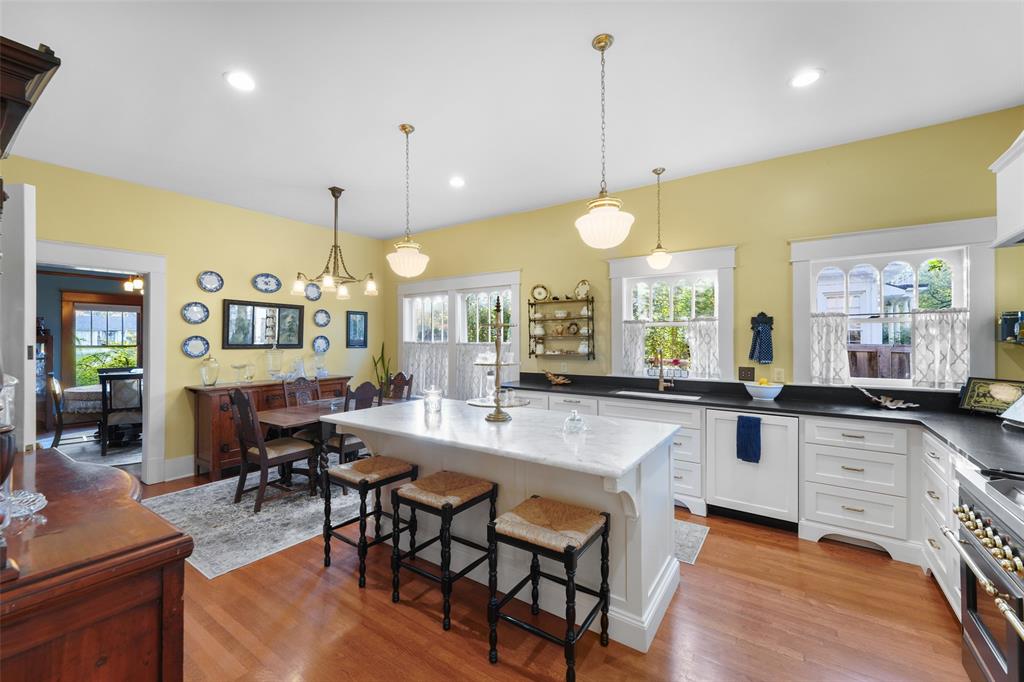 406 Griffith Avenue Terrell, TX 75160 - Photo 16 of 40 a large kitchen with lots of counter space and furniture
