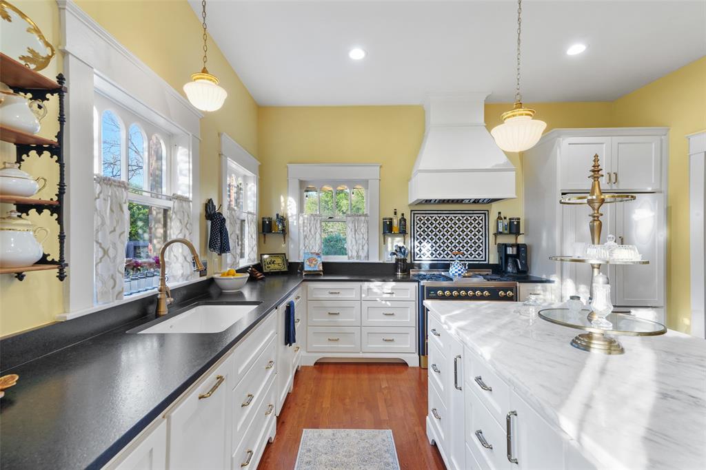406 Griffith Avenue Terrell, TX 75160 - Photo 21 of 40 a kitchen with counter top space a sink and appliances