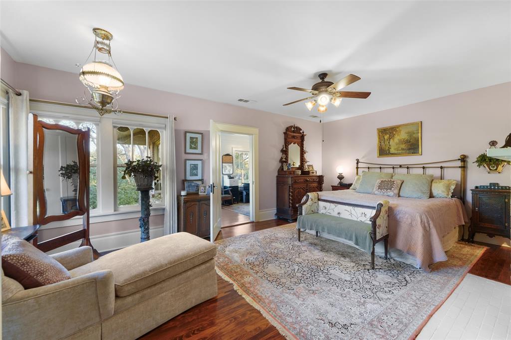 406 Griffith Avenue Terrell, TX 75160 - Photo 29 of 40 a living room with furniture and a chandelier