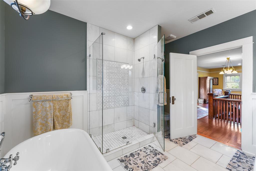 406 Griffith Avenue Terrell, TX 75160 - Photo 31 of 40 a bathroom with a shower and a toilet