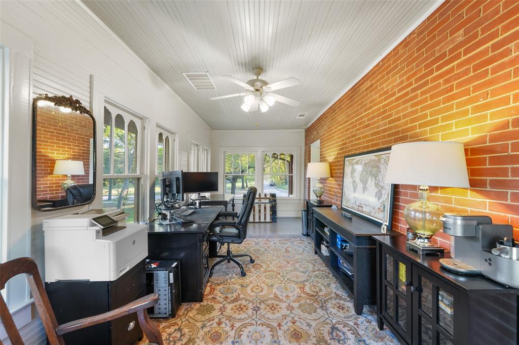 406 Griffith Avenue Terrell, TX 75160 - Photo 35 of 40 a view of a dining room with furniture window and wooden floor