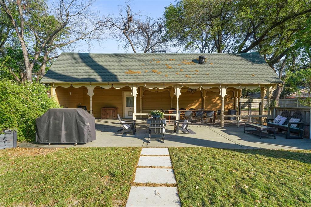 406 Griffith Avenue Terrell, TX 75160 - Photo 36 of 40 a view of a patio with swimming pool table and chairs