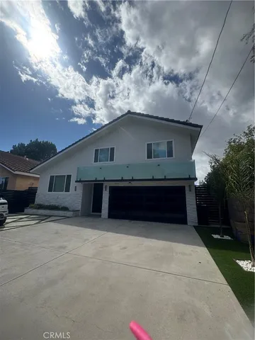 a house view with a outdoor space
