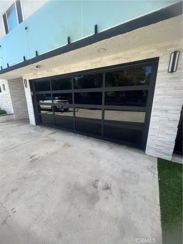 a view of an empty room with a fireplace