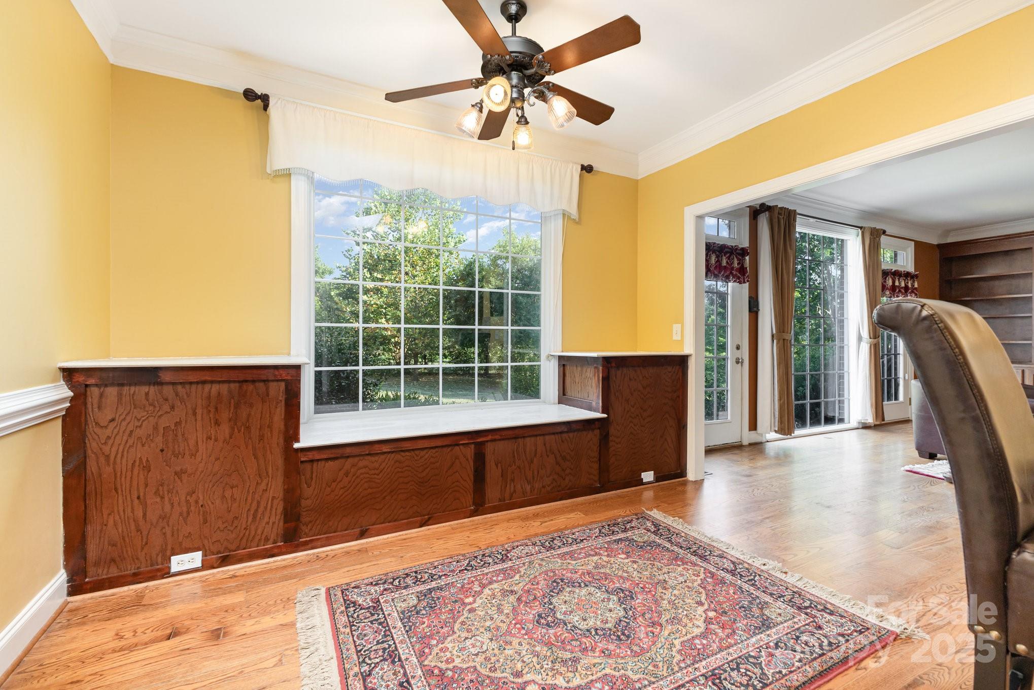 2227 Nash Road Wingate, NC 28174 - Photo 16 of 40 a view of a livingroom with furniture window and wooden floor