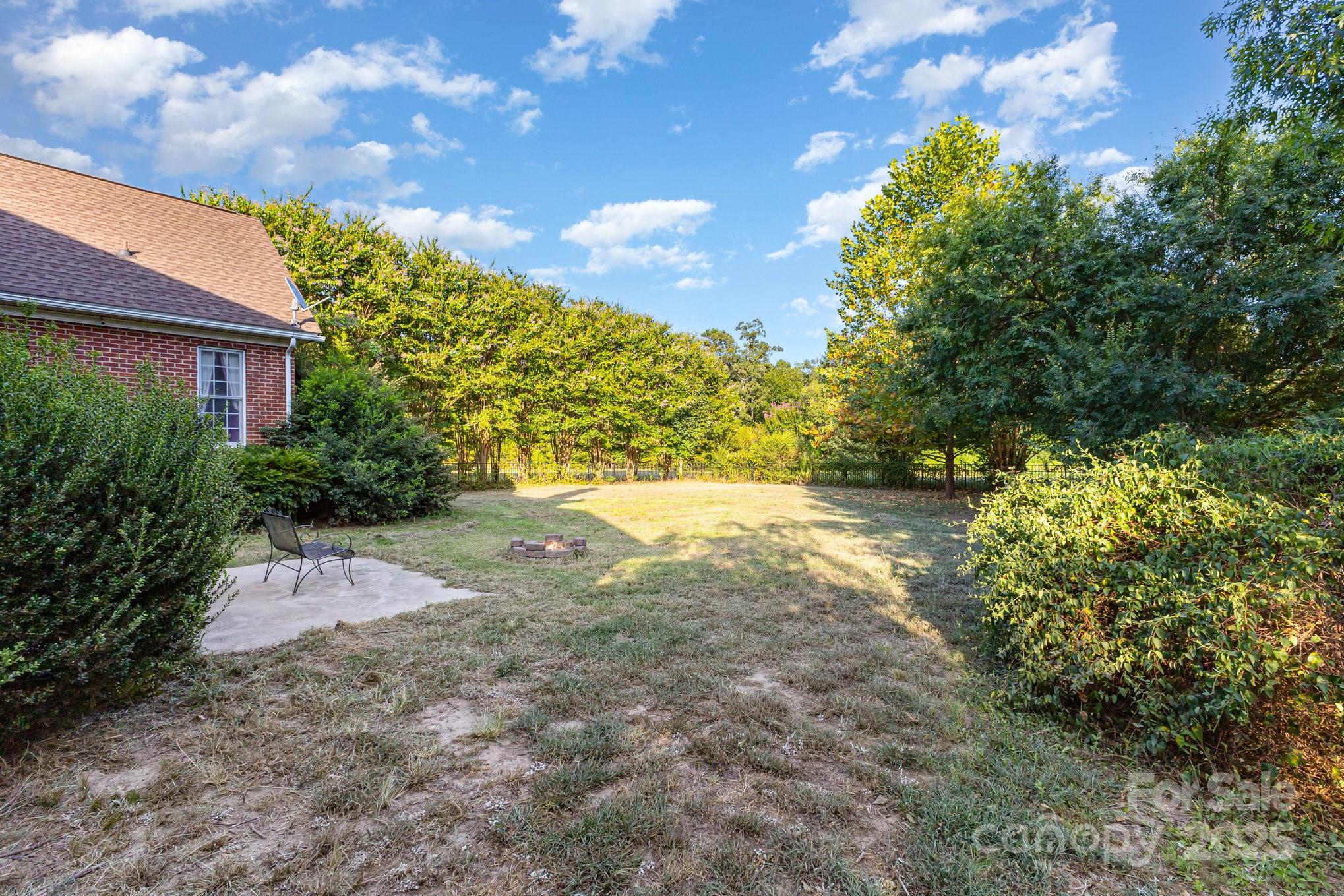 2227 Nash Road Wingate, NC 28174 - Photo 32 of 40 a view of backyard of house