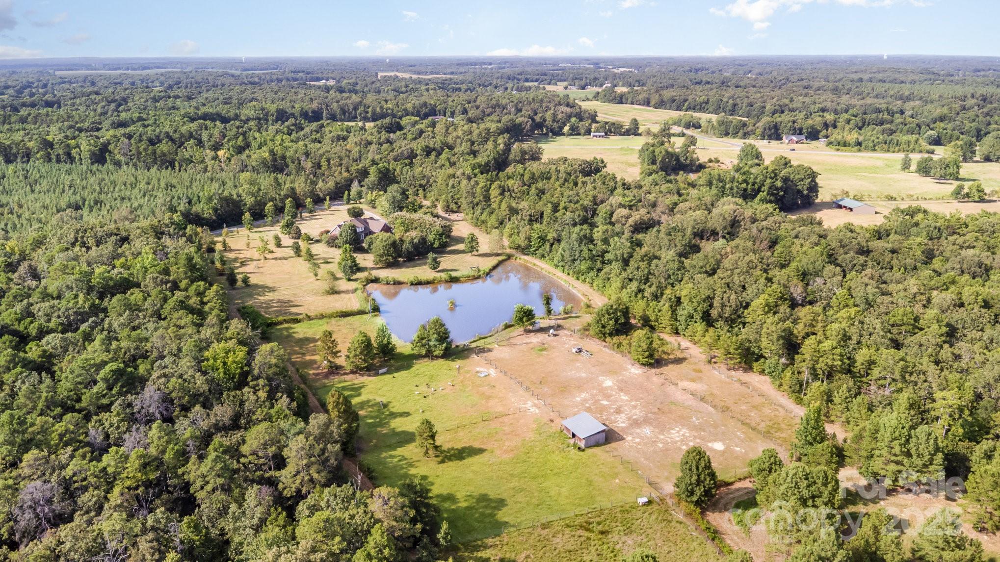 2227 Nash Road Wingate, NC 28174 - Photo 39 of 40 a view of a city with mountains in the background