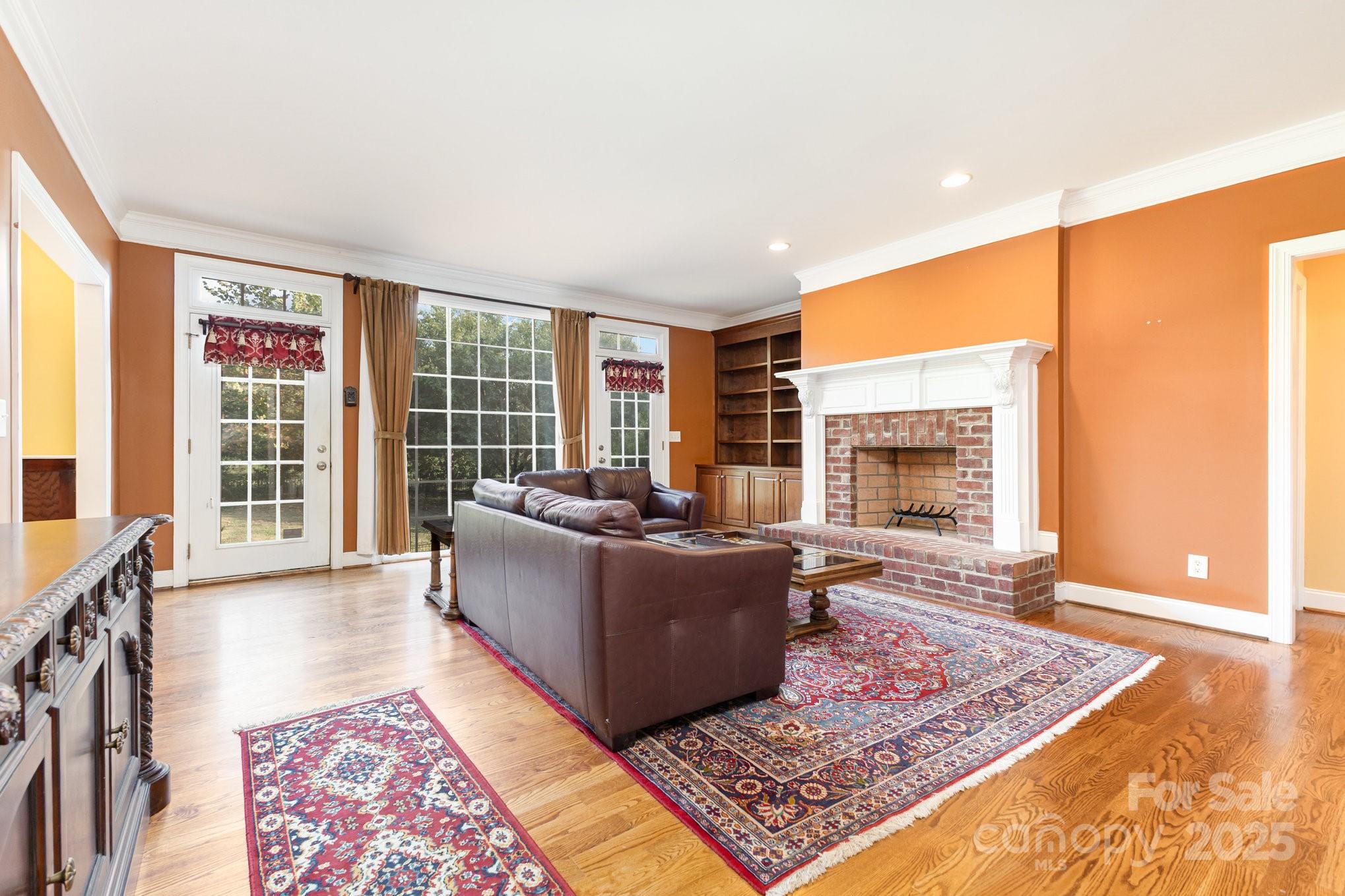 2227 Nash Road Wingate, NC 28174 - Photo 8 of 40 a living room with furniture rug and wooden floor