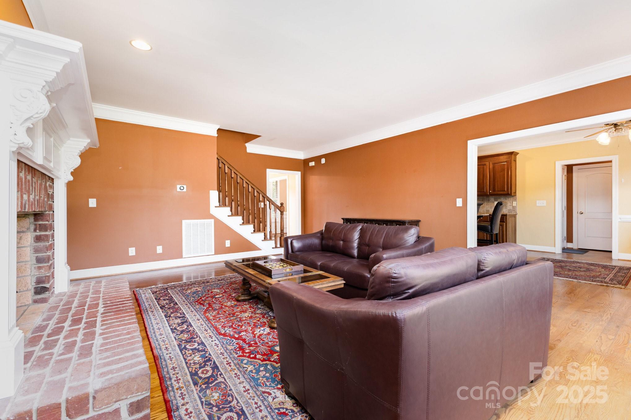 2227 Nash Road Wingate, NC 28174 - Photo 10 of 40 a living room with furniture and a rug