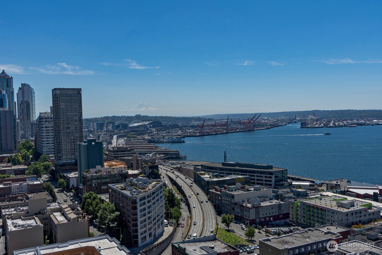 121 Vine Street, Unit 703 Seattle, WA 98121 - Photo 1 of 37 a view of a city