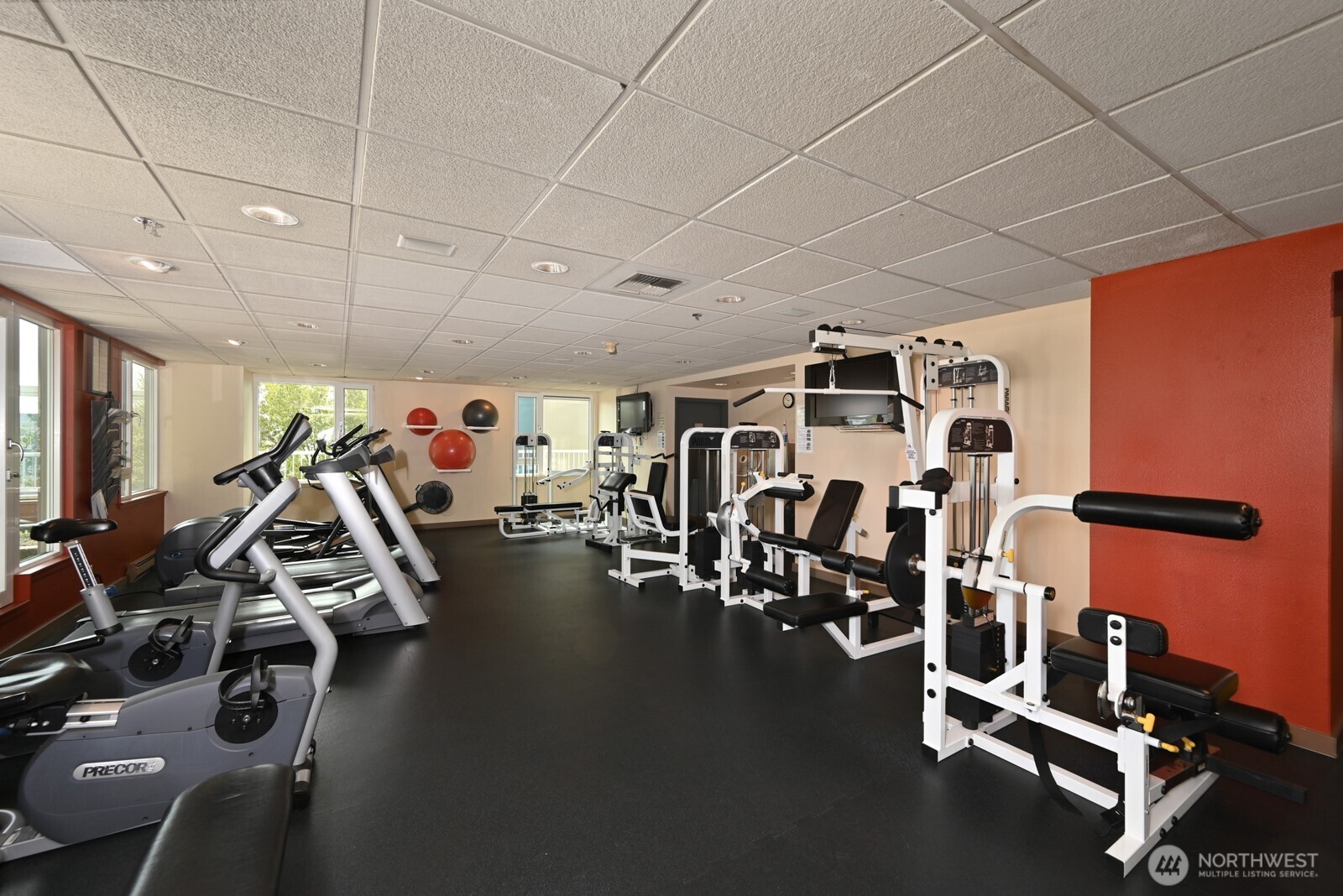 121 Vine Street, Unit 703 Seattle, WA 98121 - Photo 30 of 37 a view of a room with gym equipment