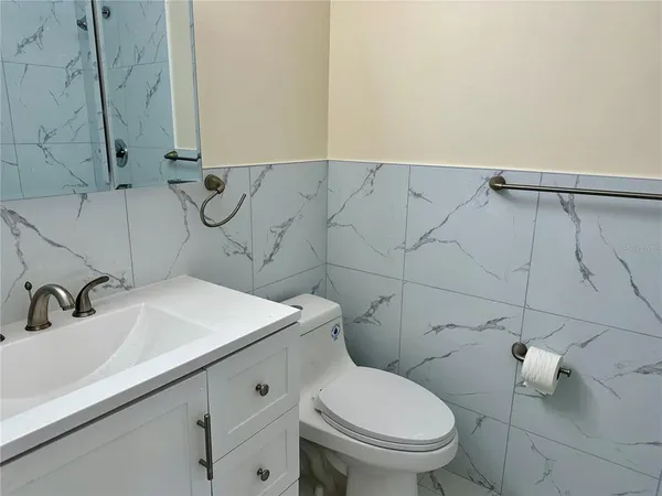 a bathroom with a sink and a toilet