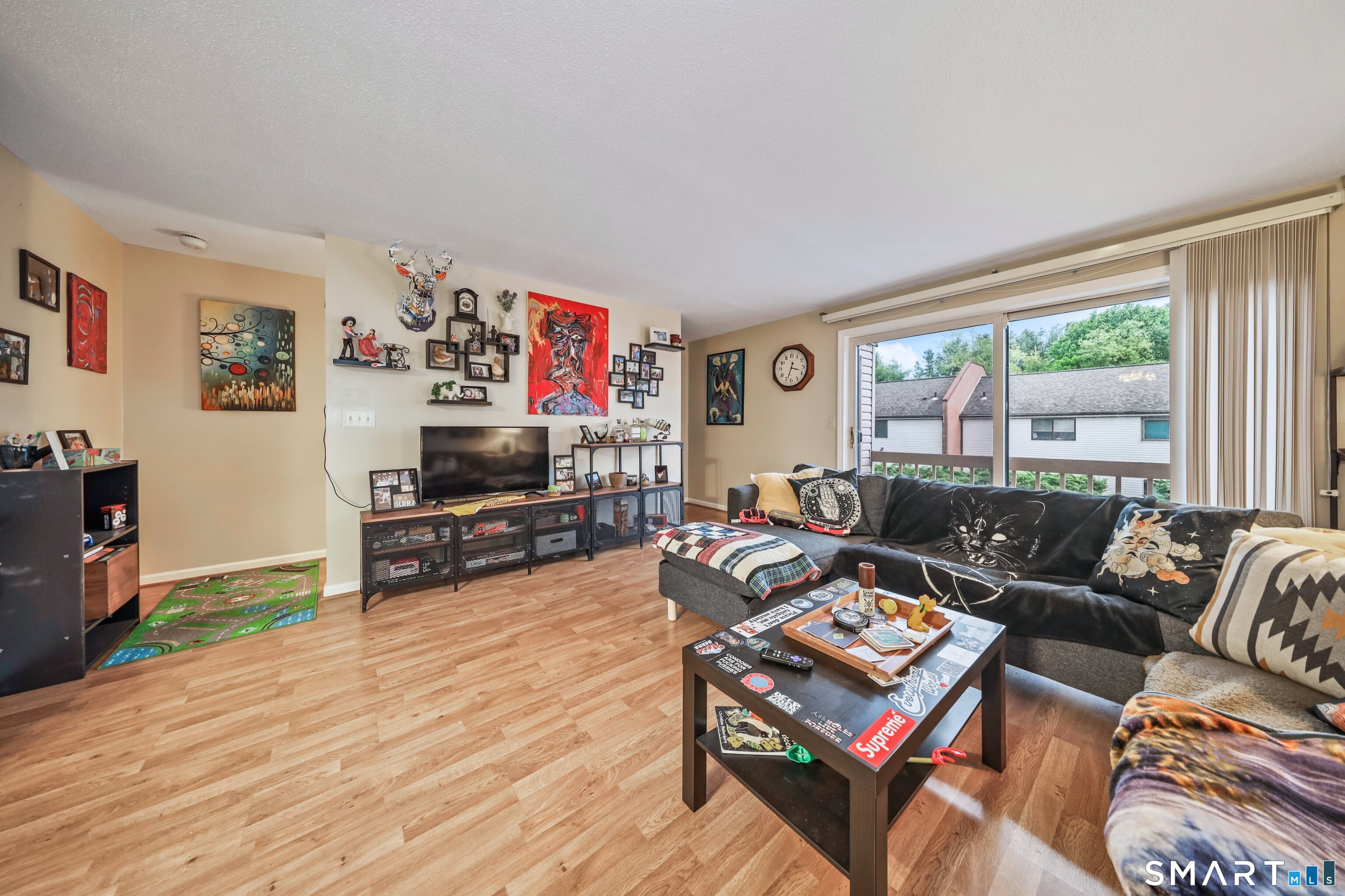 349 Allen Road, Unit 34C Torrington, CT 06790 - Photo 5 of 31 a living room with furniture and a flat screen tv