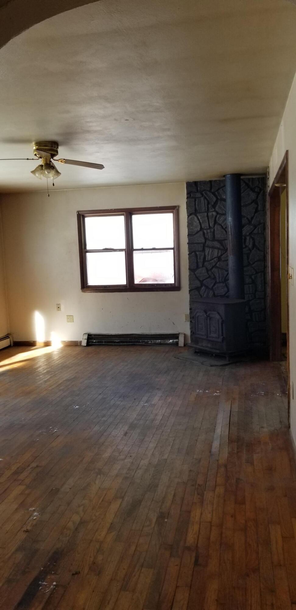 236 Sandisfield Road Sandisfield, MA 01255 - Photo 4 of 8 an empty room with windows