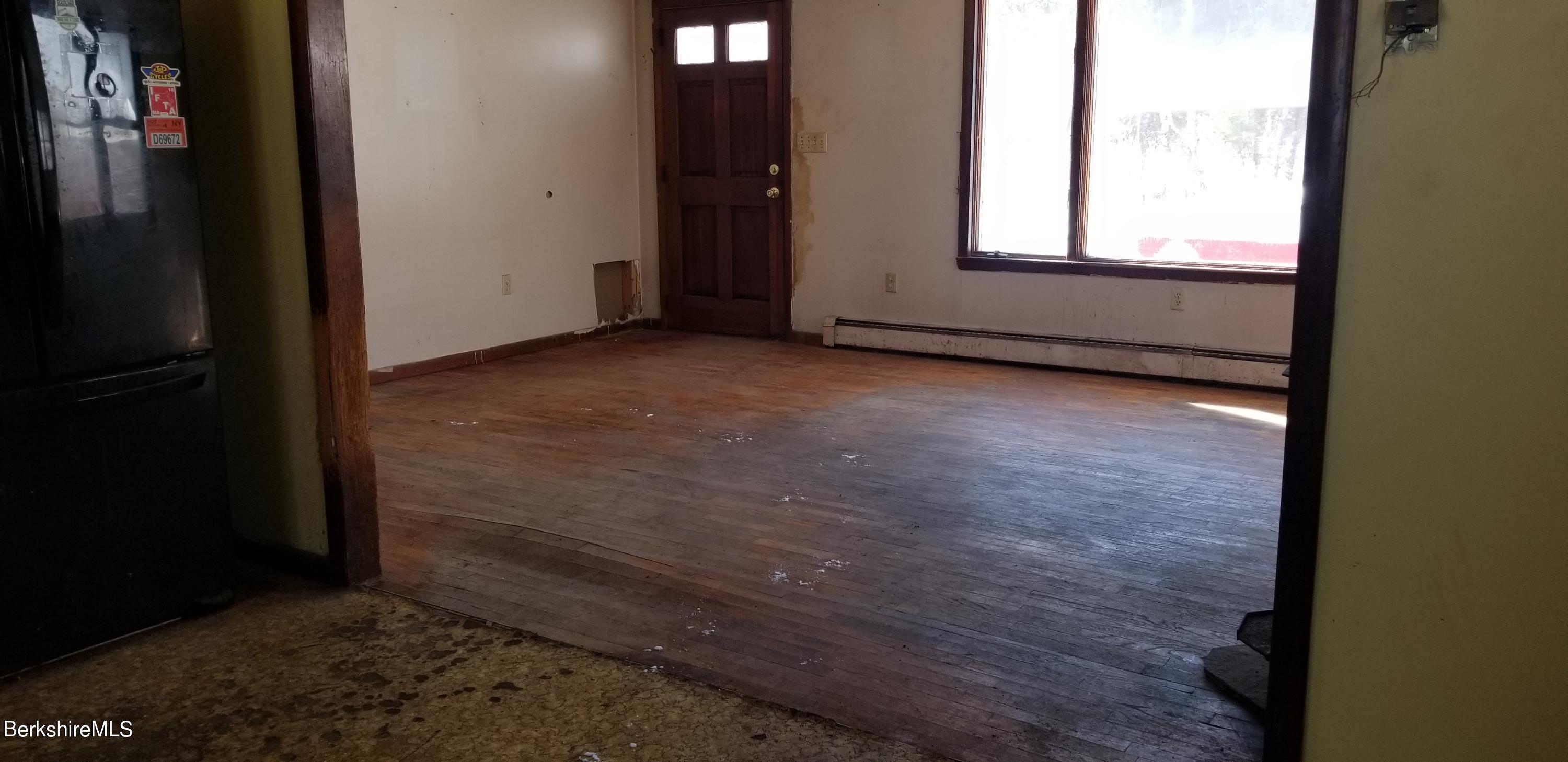 236 Sandisfield Road Sandisfield, MA 01255 - Photo 5 of 8 a view of an empty room with window
