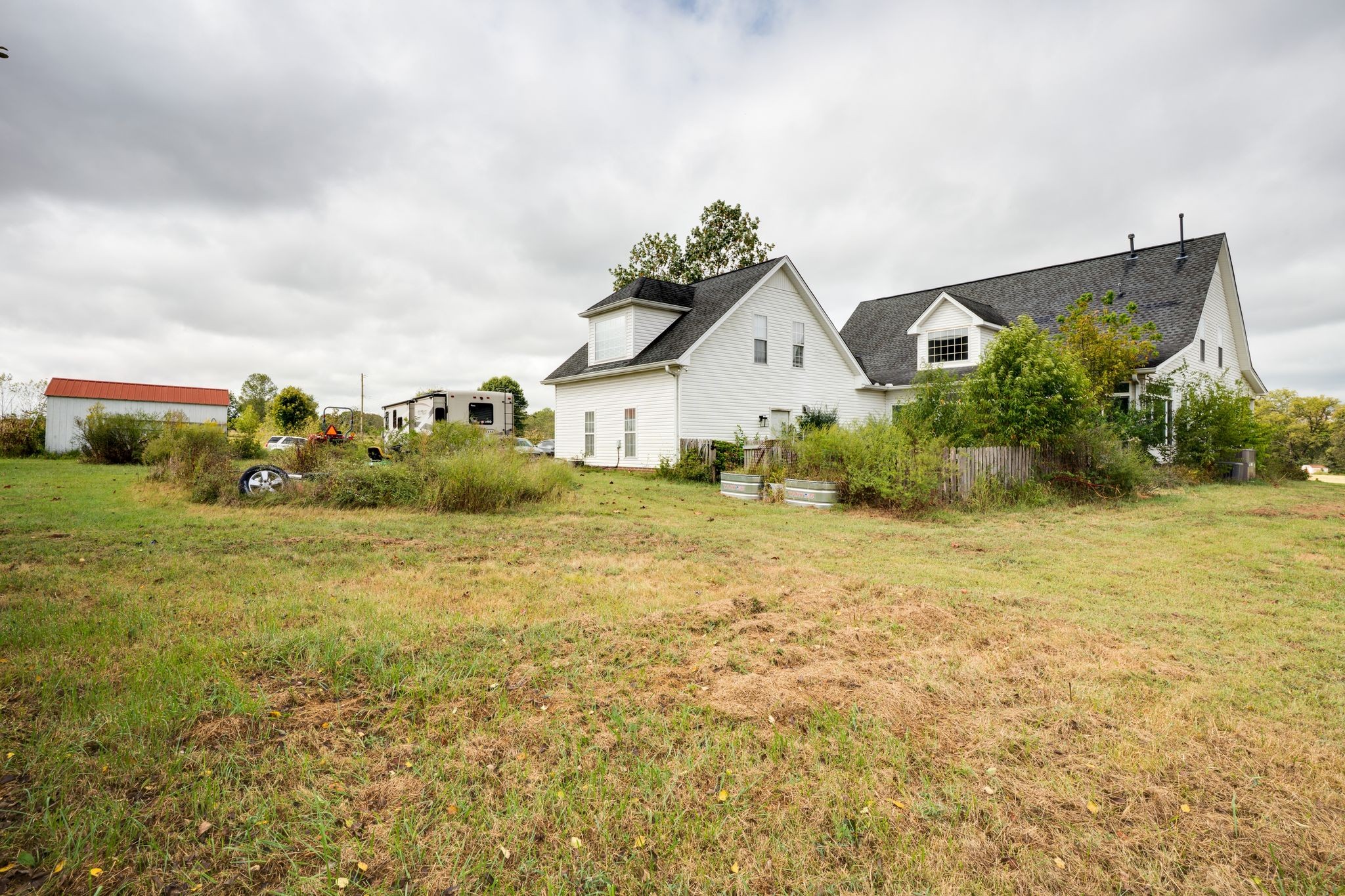1038 Old Hopewell Road Castalian Springs, TN 37031 - Photo 11 of 19 a front view of a house with garden