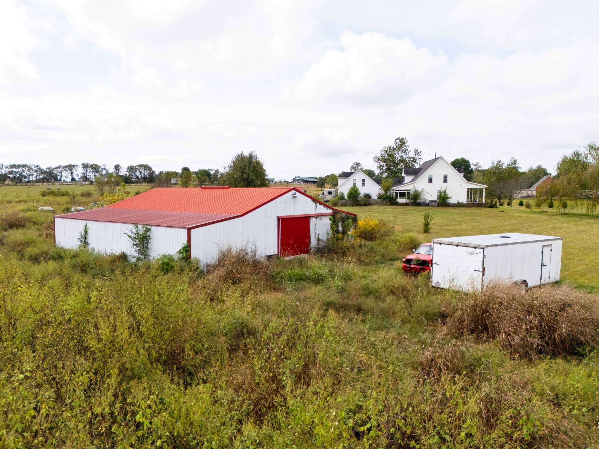 1038 Old Hopewell Road Castalian Springs, TN 37031 - Photo 13 of 19 a view of a city with lawn chairs and large trees