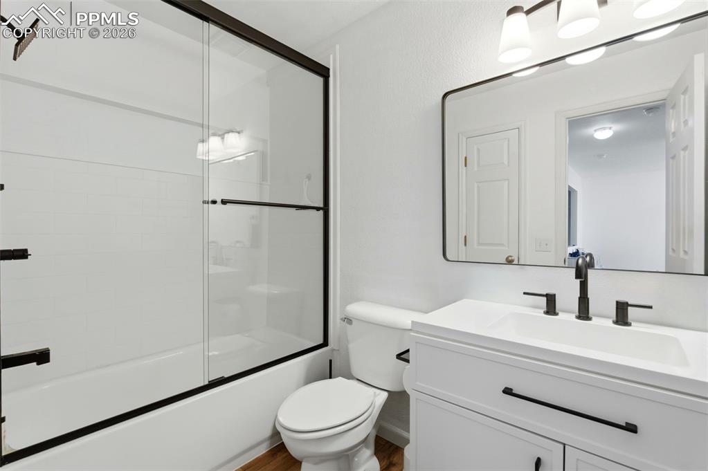 11175 Berry Farm Road Fountain, CO 80817 - Photo 12 of 40 a bathroom with a sink toilet and shower