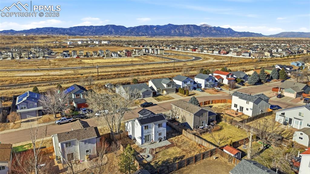 11175 Berry Farm Road Fountain, CO 80817 - Photo 33 of 40 an aerial view of residential building and parking space
