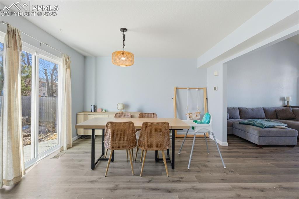 11175 Berry Farm Road Fountain, CO 80817 - Photo 7 of 40 a view of a dining room with furniture