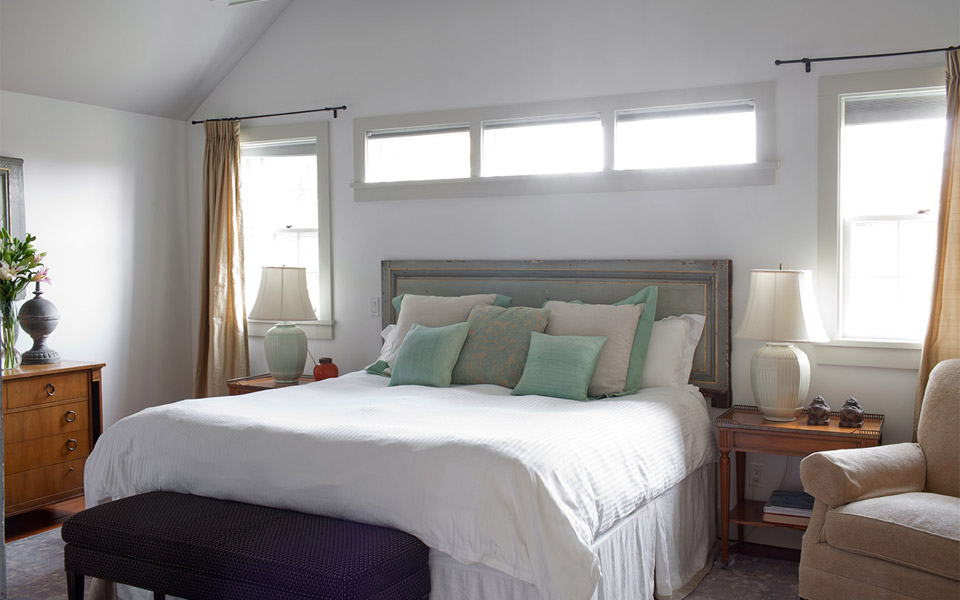 36 R Cliff Road Nantucket, MA 02554 - Photo 13 of 22 a bedroom with a bed a couch and a window