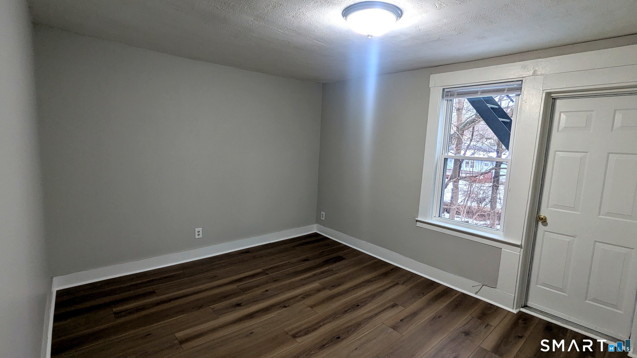 116 Old Foxon Road East Haven, CT 06513 - Photo 11 of 35 a view of an empty room and window