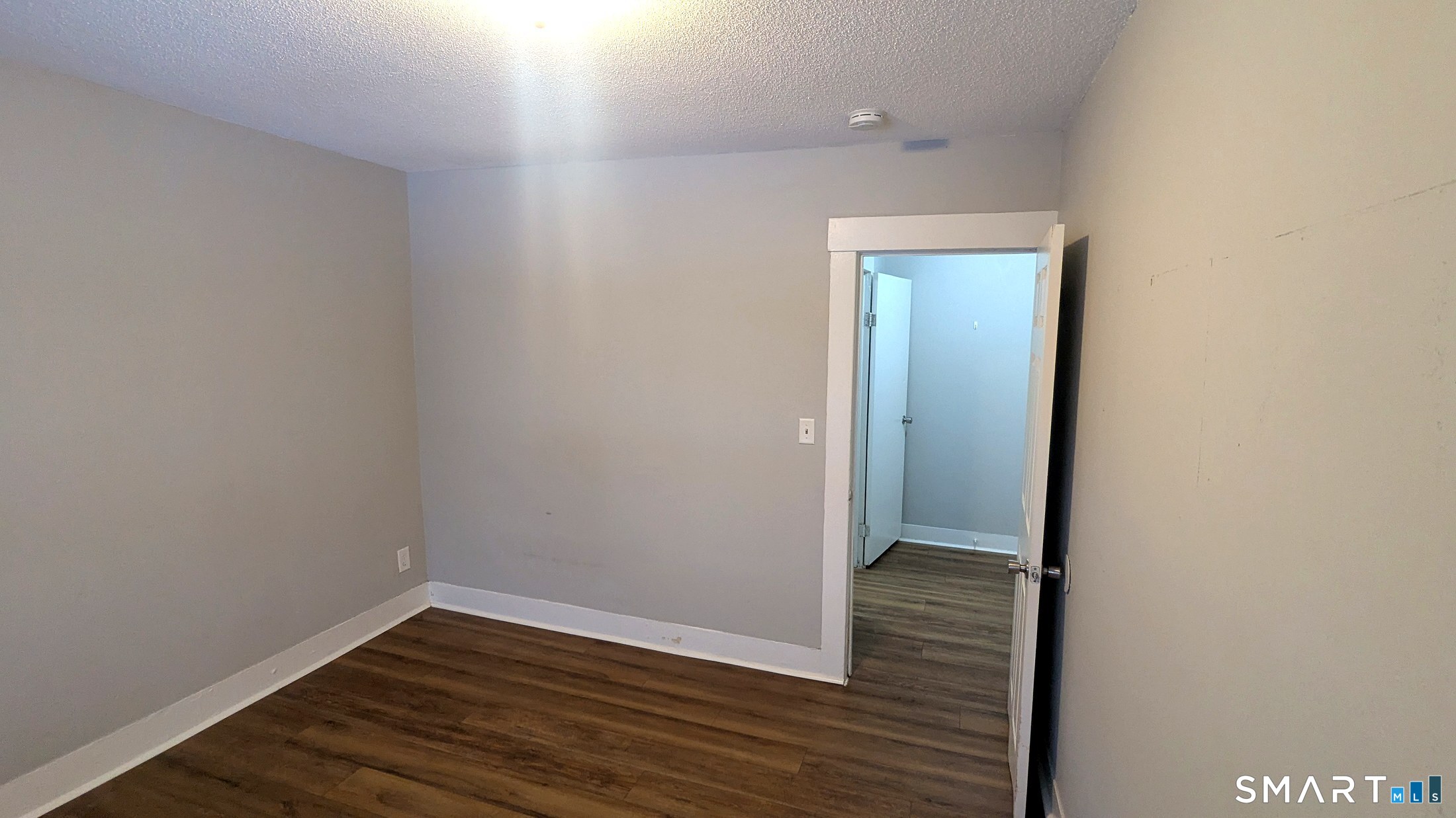 116 Old Foxon Road East Haven, CT 06513 - Photo 20 of 35 a view of a small space with wooden floor