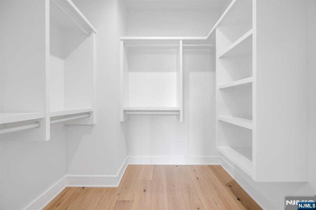 17 Feldman Court Paramus, NJ 07652 - Photo 32 of 47 a view of an empty walk in closet