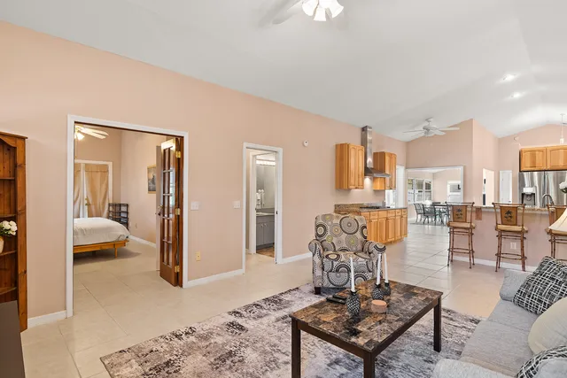 a living room with furniture and a table