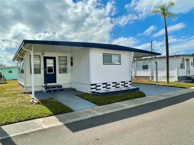 a front view of house with yard