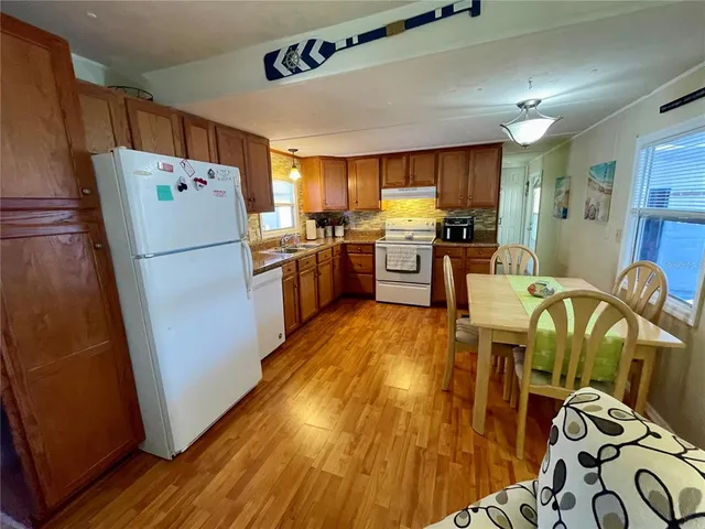 a bedroom with furniture and a fireplace