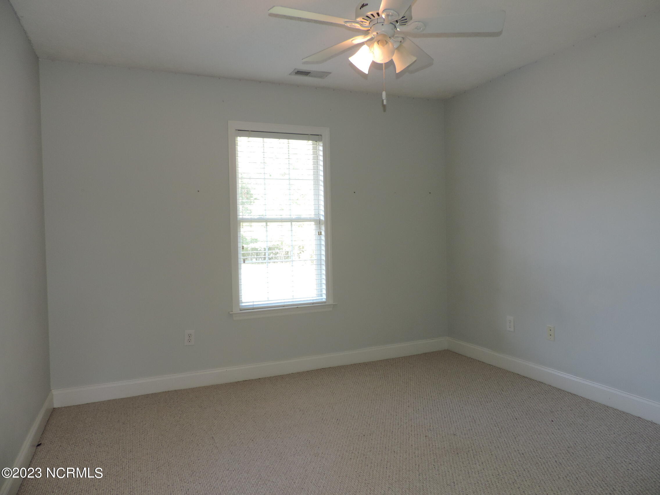 130 Hidden Pond Drive New Bern, NC 28562 - Photo 22 of 29 bedroom 3 - back