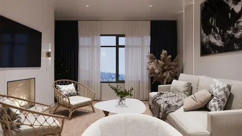 a living room with furniture and a flat screen tv