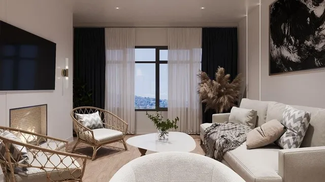 a living room with furniture and a flat screen tv