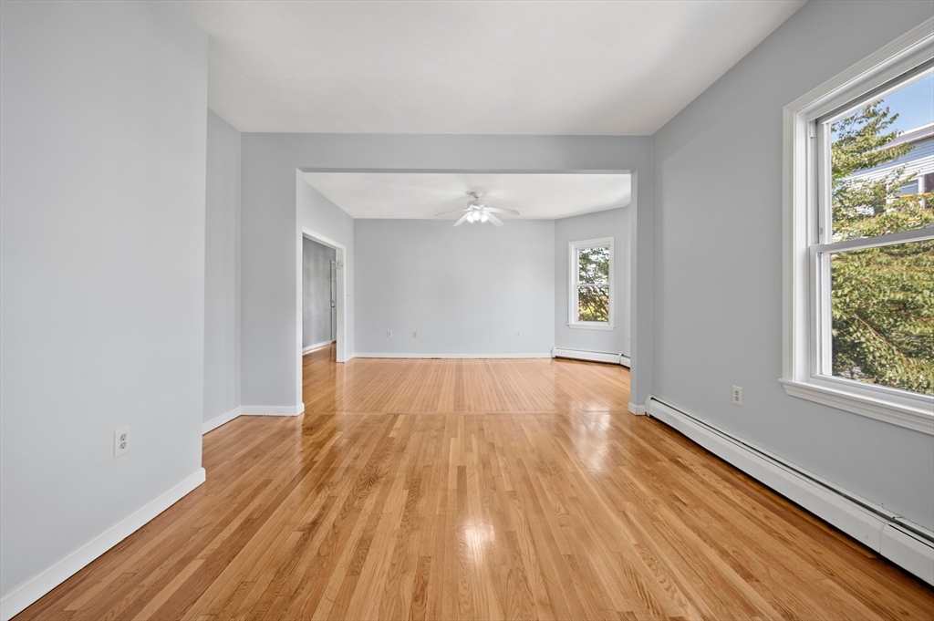 61 Shurtleff Street, Unit 4 Chelsea, MA 02150 - Photo 14 of 32 a view of a room with wooden floor and window
