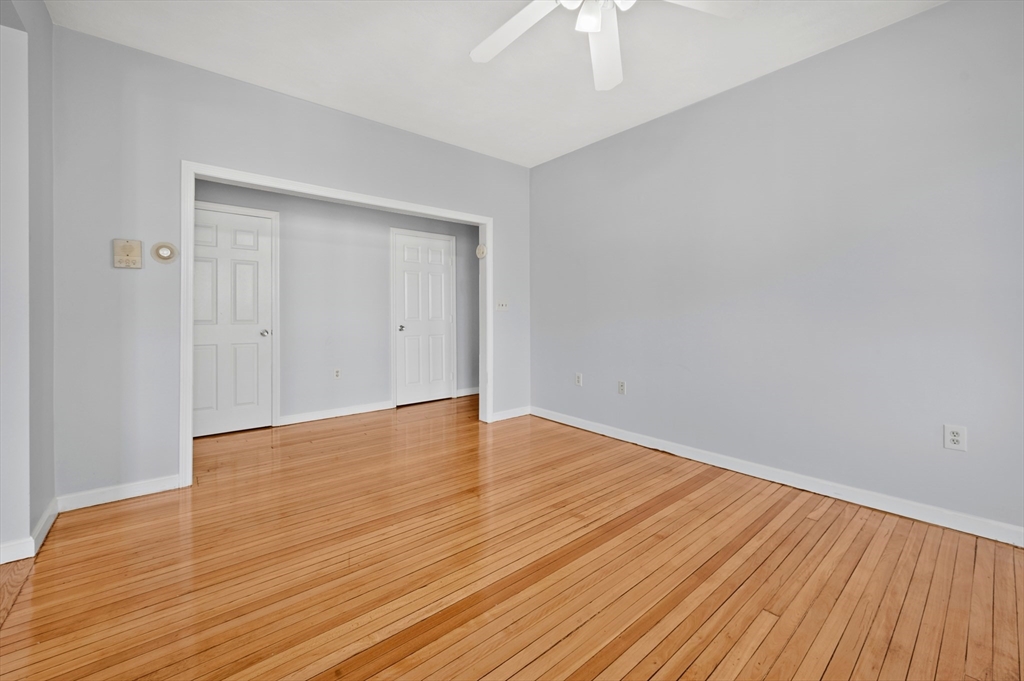 61 Shurtleff Street, Unit 4 Chelsea, MA 02150 - Photo 15 of 32 a view of an empty room with wooden floor