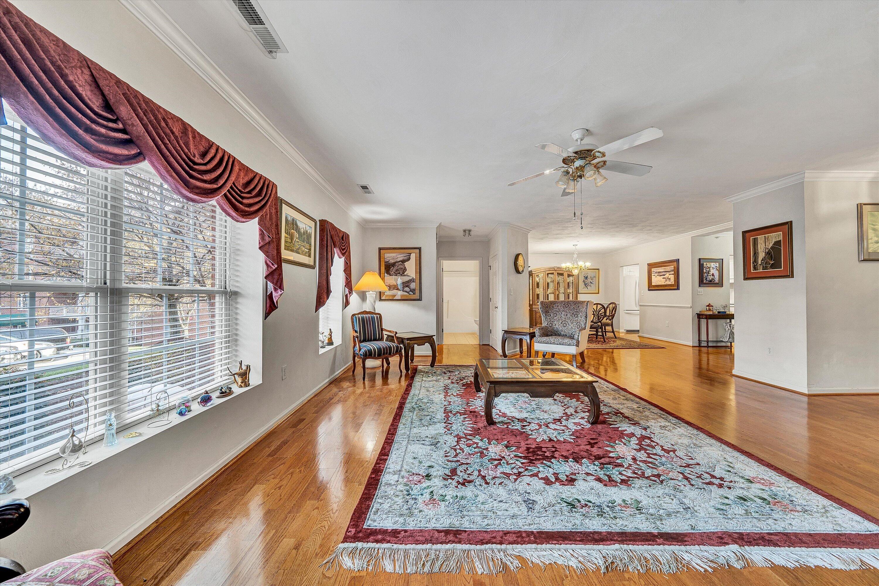 4434 Pheasant Ridge Road, Unit 101 Roanoke, VA 24014 - Photo 18 of 31 a living room with furniture and a rug