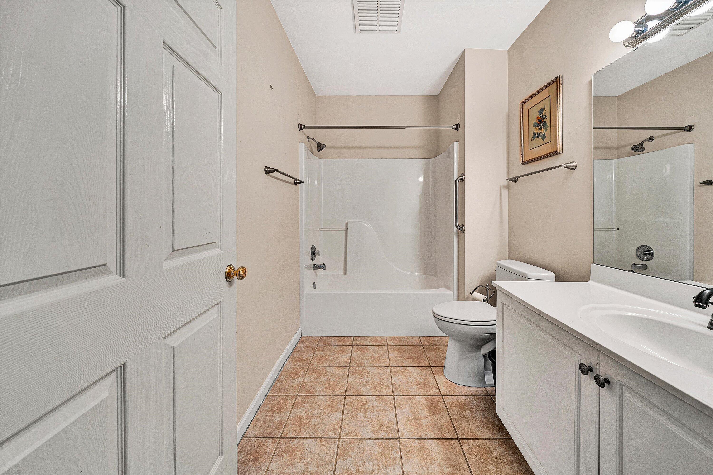 4434 Pheasant Ridge Road, Unit 101 Roanoke, VA 24014 - Photo 20 of 31 a bathroom with a sink a toilet and shower