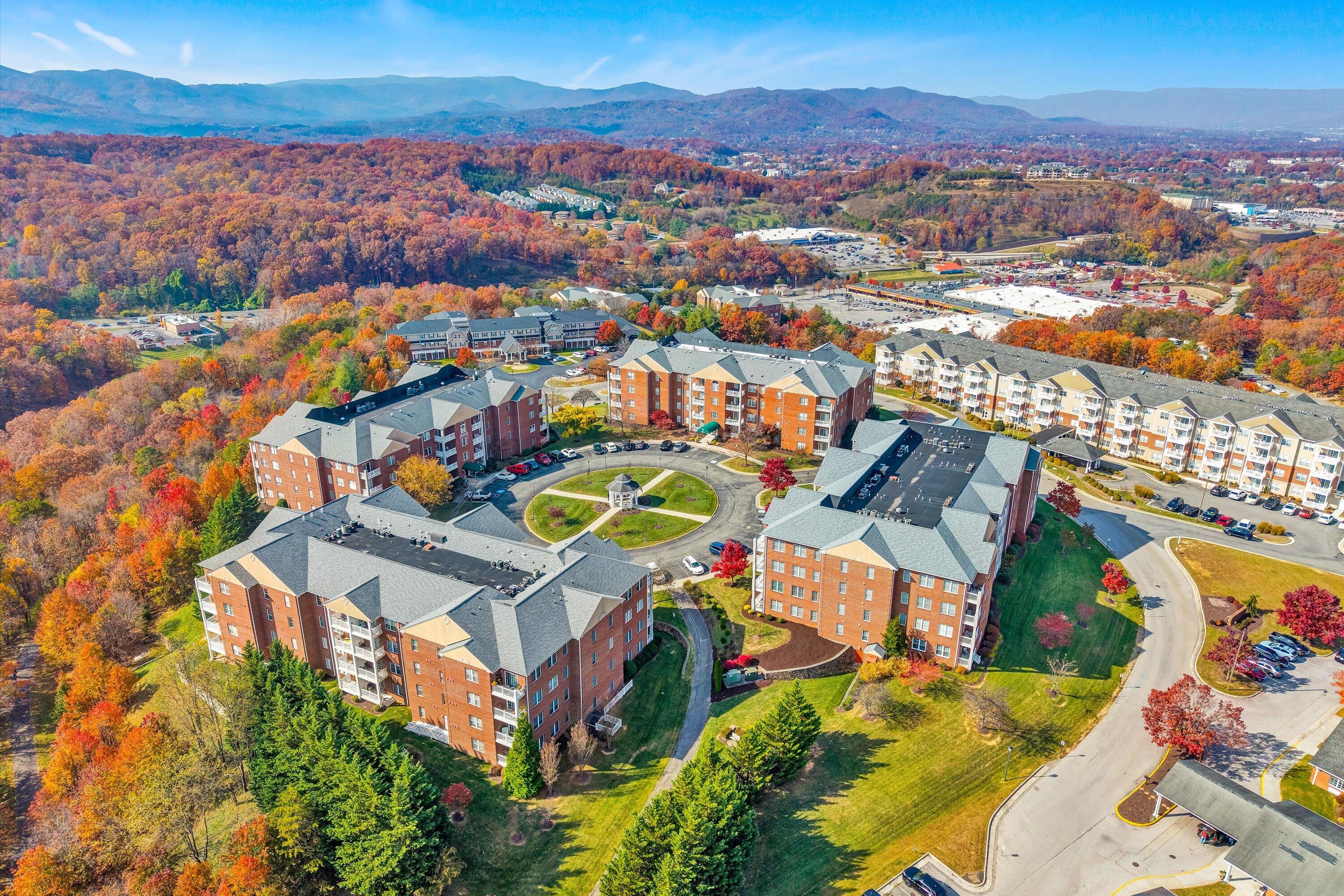 4434 Pheasant Ridge Road, Unit 101 Roanoke, VA 24014 - Photo 2 of 31 an aerial view of residential houses with outdoor space